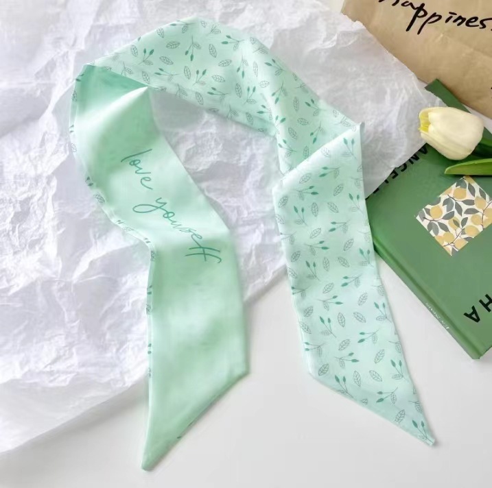 Silk scarf green background with leaves
