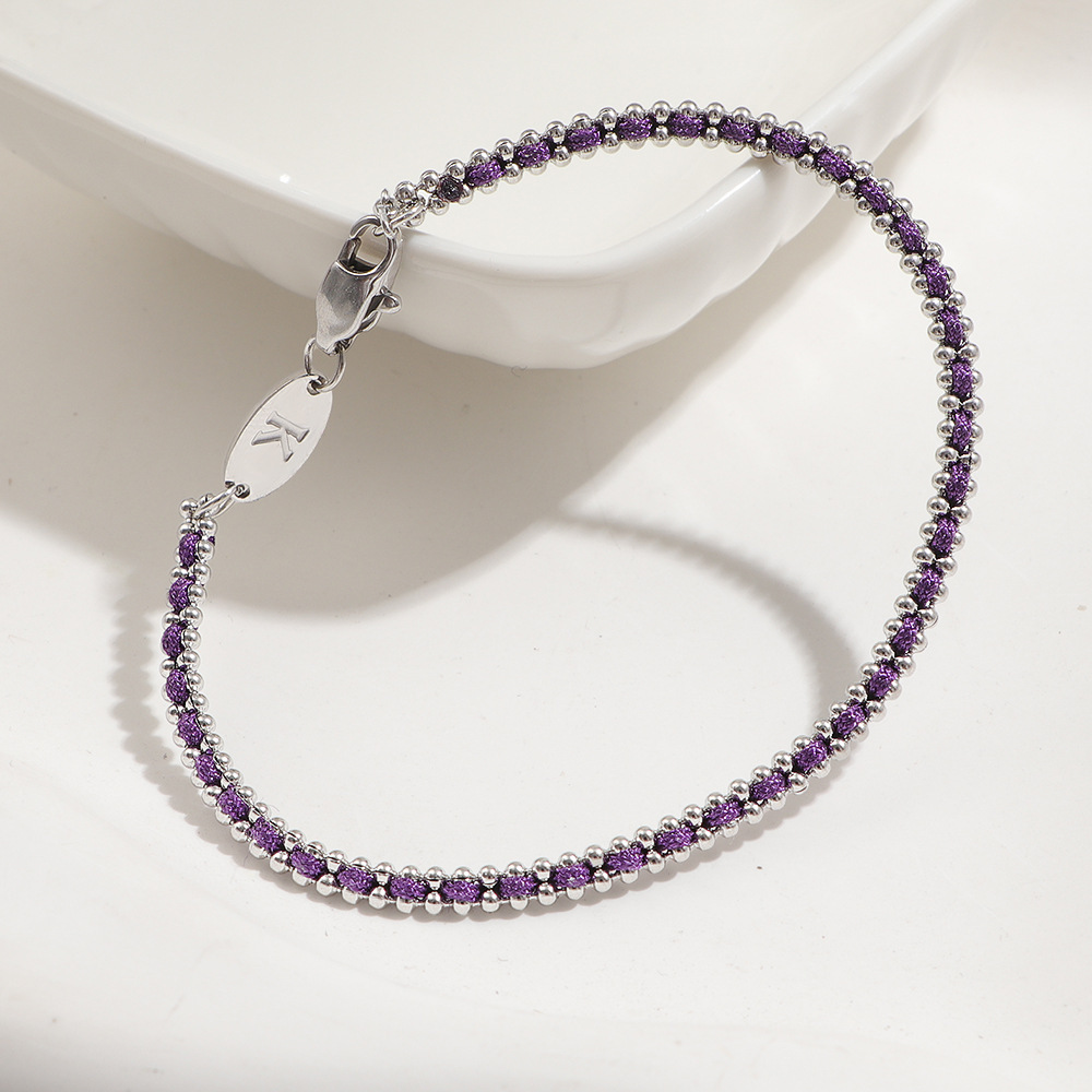 bracelet en corde violette tressée couleur acier
