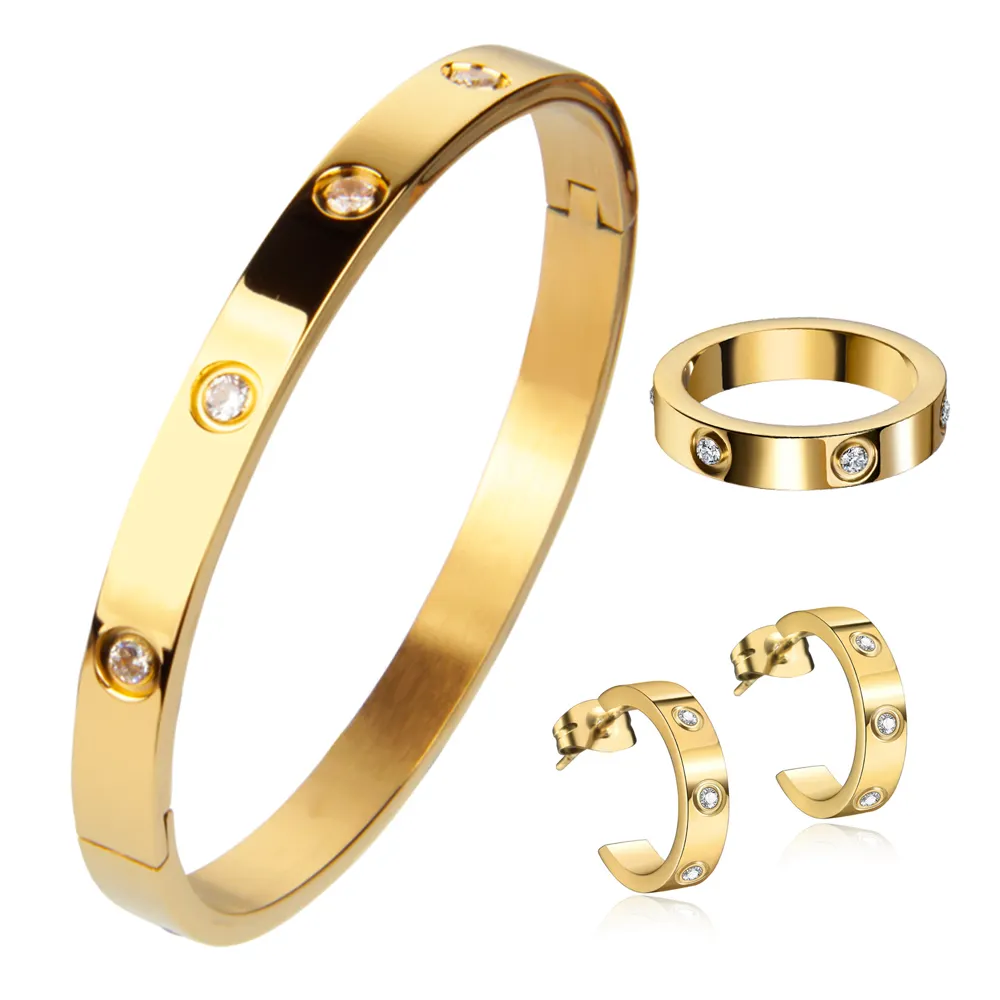 Exquisitos accesorios de regalo de joyería estilo pareja diamante chapado en oro de 18 quilates 3 piezas traje pendientes de acero inoxidable anillo pulsera