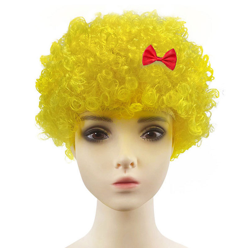 Fans wear yellow afro-bow tie