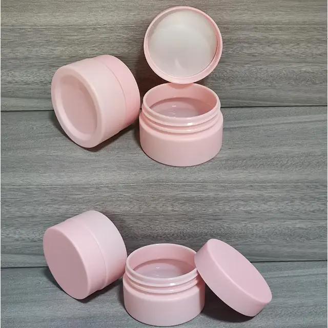 Bouteille de baume à lèvres personnalisée en rose mat de 25ml et capuchon rose mat de 47mm, bouteille hydratante de crème cosmétique en plastique pour animaux de compagnie.