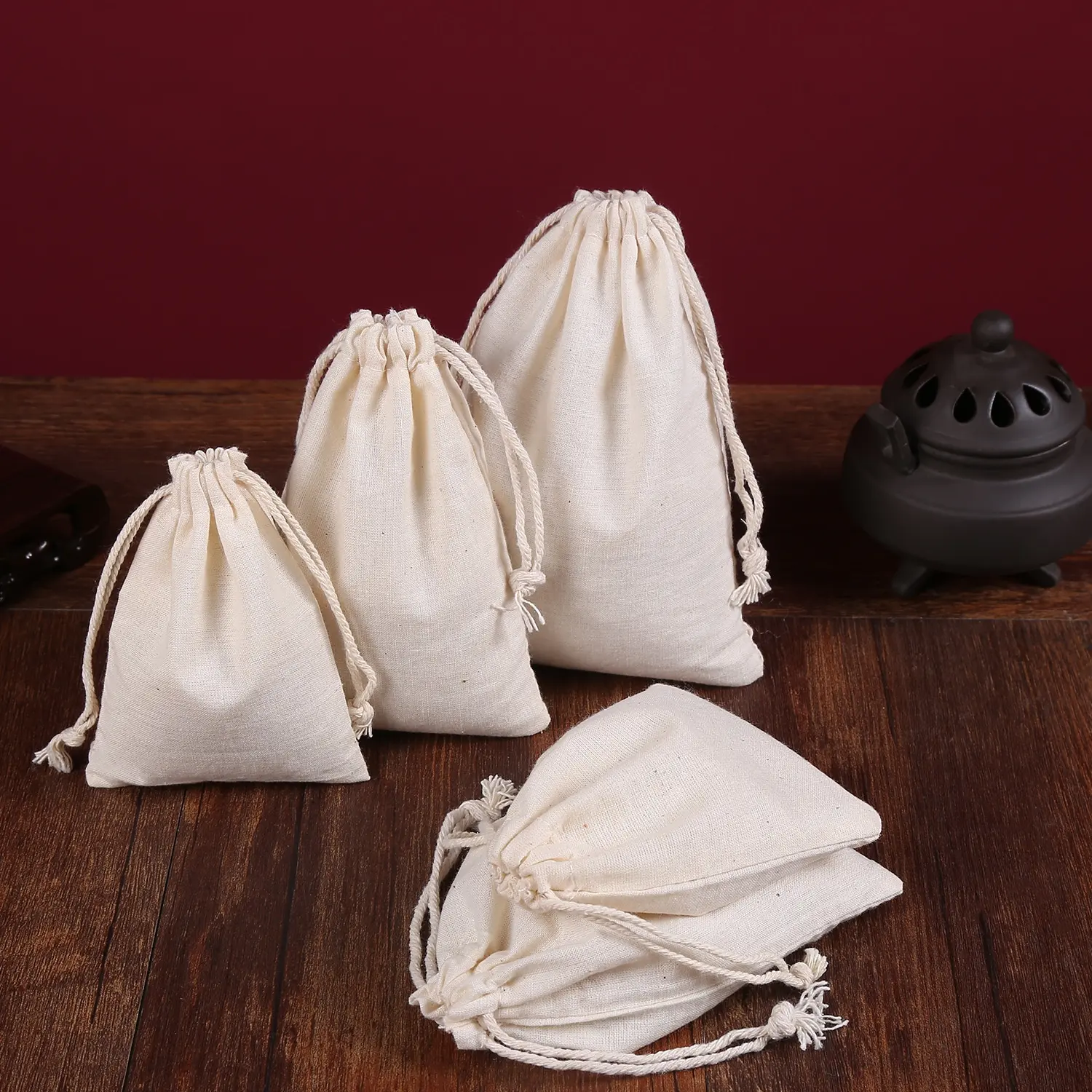 卸売環境にやさしいモスリン再利用可能なリサイクル可能なカスタムロゴプリントオーガニックコットンキャンバス巾着袋