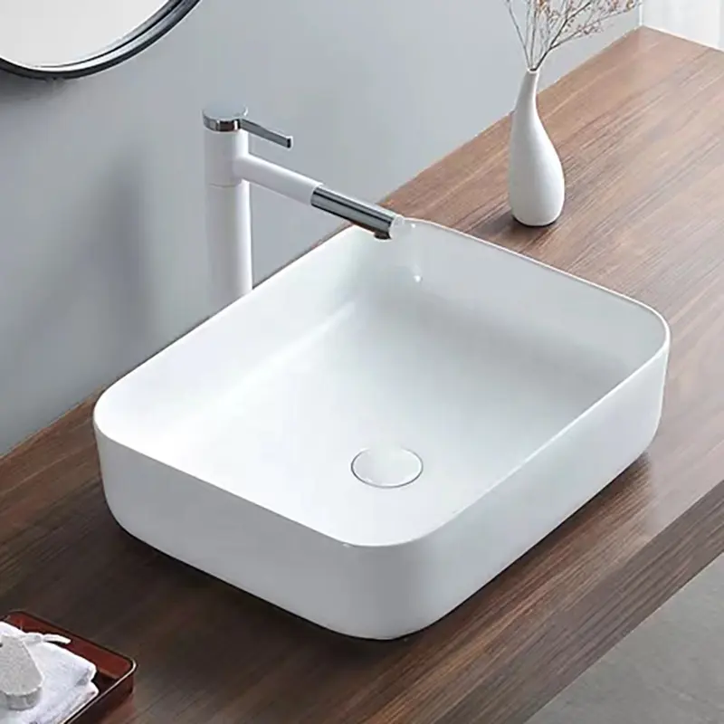 Lavabo moderno in ceramica bianca a superficie solida con montaggio rettangolare Vanity Top Cabinet Art bagno lavabo a mano