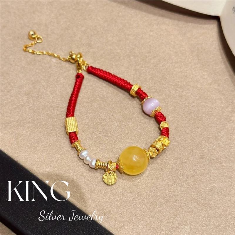Bracelet fil rouge ambre (réglable 15-19cm)
