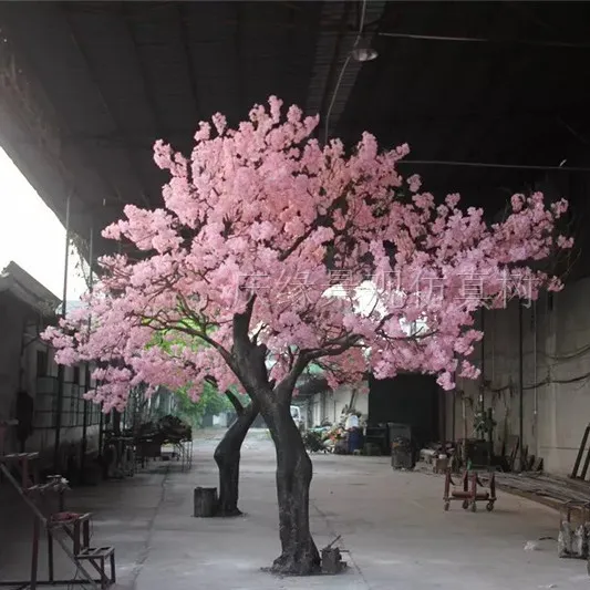 Starker Taifun im Freien Landschafts hochzeit künstlicher rosa Kirschblüten baum