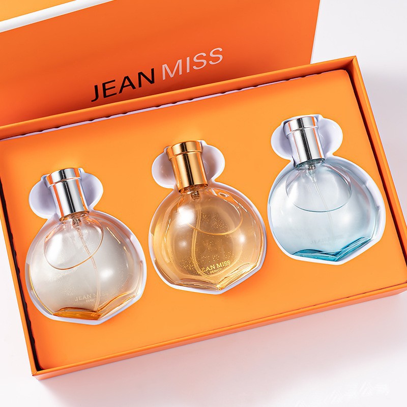 Boîte cadeau vide en forme d'étoile orange.