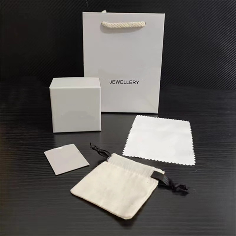 Caja para anillos/pendientes gris