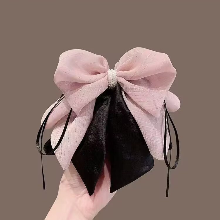 clip noir en poudre de perle
