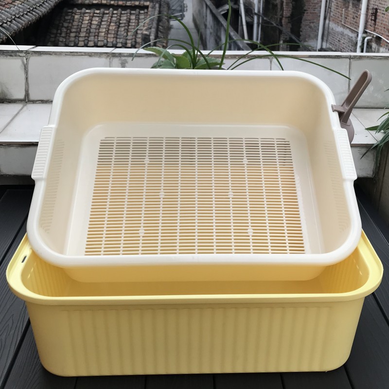 Rejilla superior beige lavabo inferior amarillo