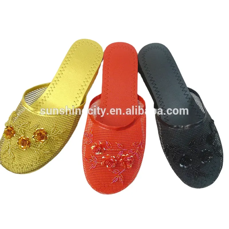 Pantofole con perline cinesi