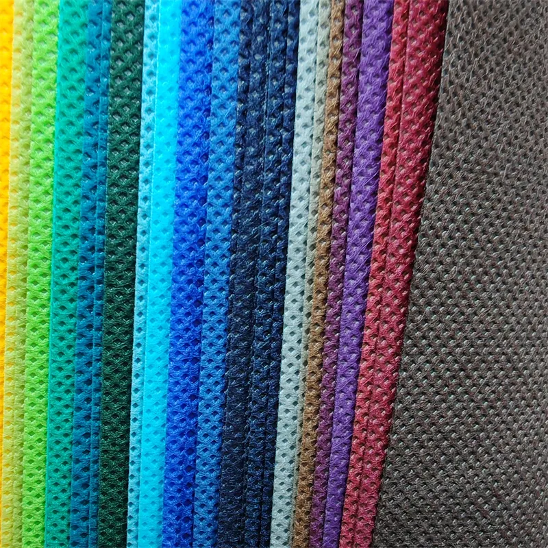 100% PP buena imbibición de agua colorido polipropileno Spunbonded en relieve telas no tejidas para la fabricación de bolsas