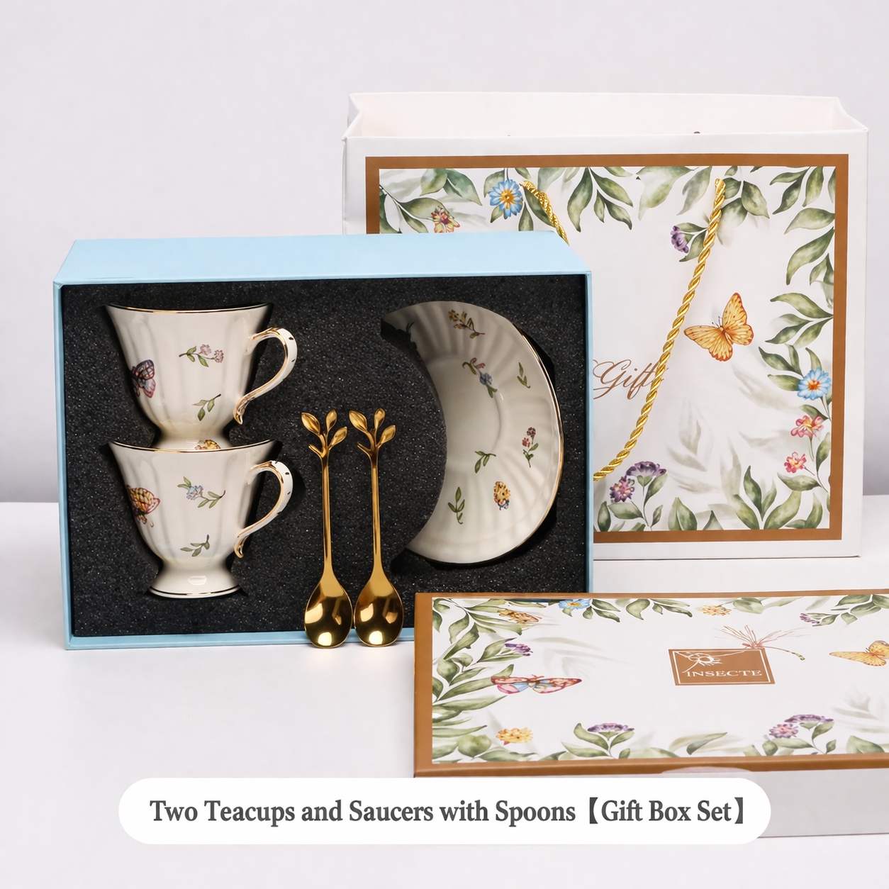 Juego de regalo de dos tazas de té y platillos con cucharas