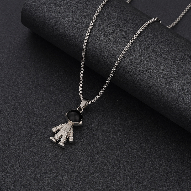 Chaîne en acier titane astronaute avec petit pendentif goutte d'huile.