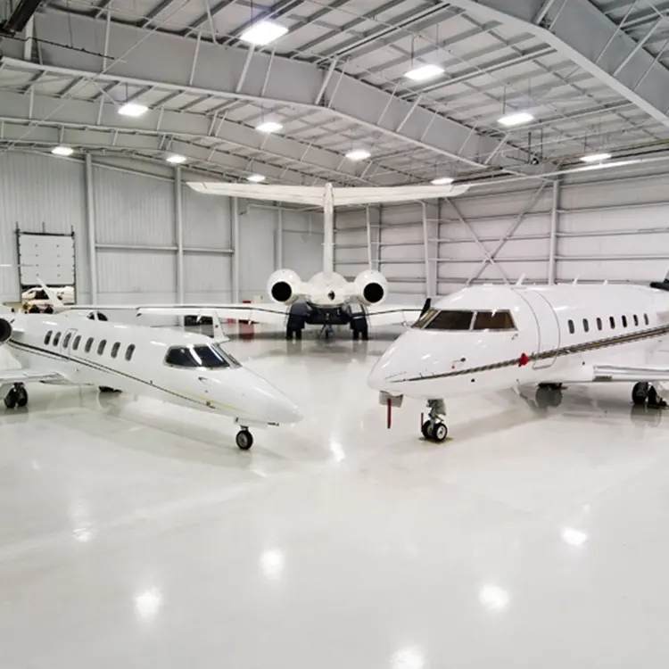 โรงเก็บเครื่องบิน,โรงเก็บเครื่องบินโครงสร้างเหล็กโรงเก็บเครื่องบินรูปแบบสำเร็จรูปทนไฟการออกแบบทางเศรษฐกิจมาตรฐานสูง