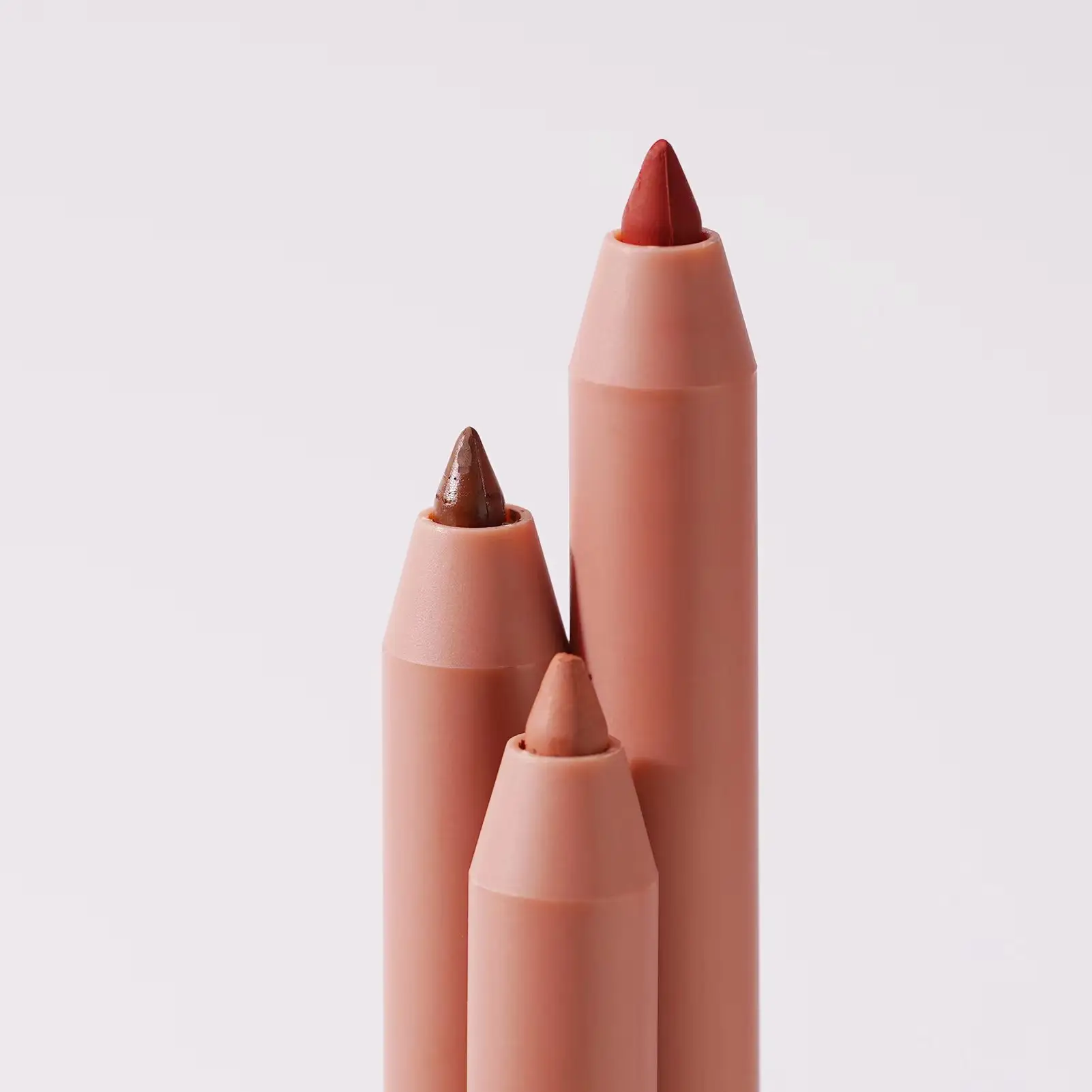 Delineador de labios mate a prueba de manchas retráctil cremoso de larga duración personalizado de etiqueta privada lápiz labial rosa lápiz labial marrón desnudo