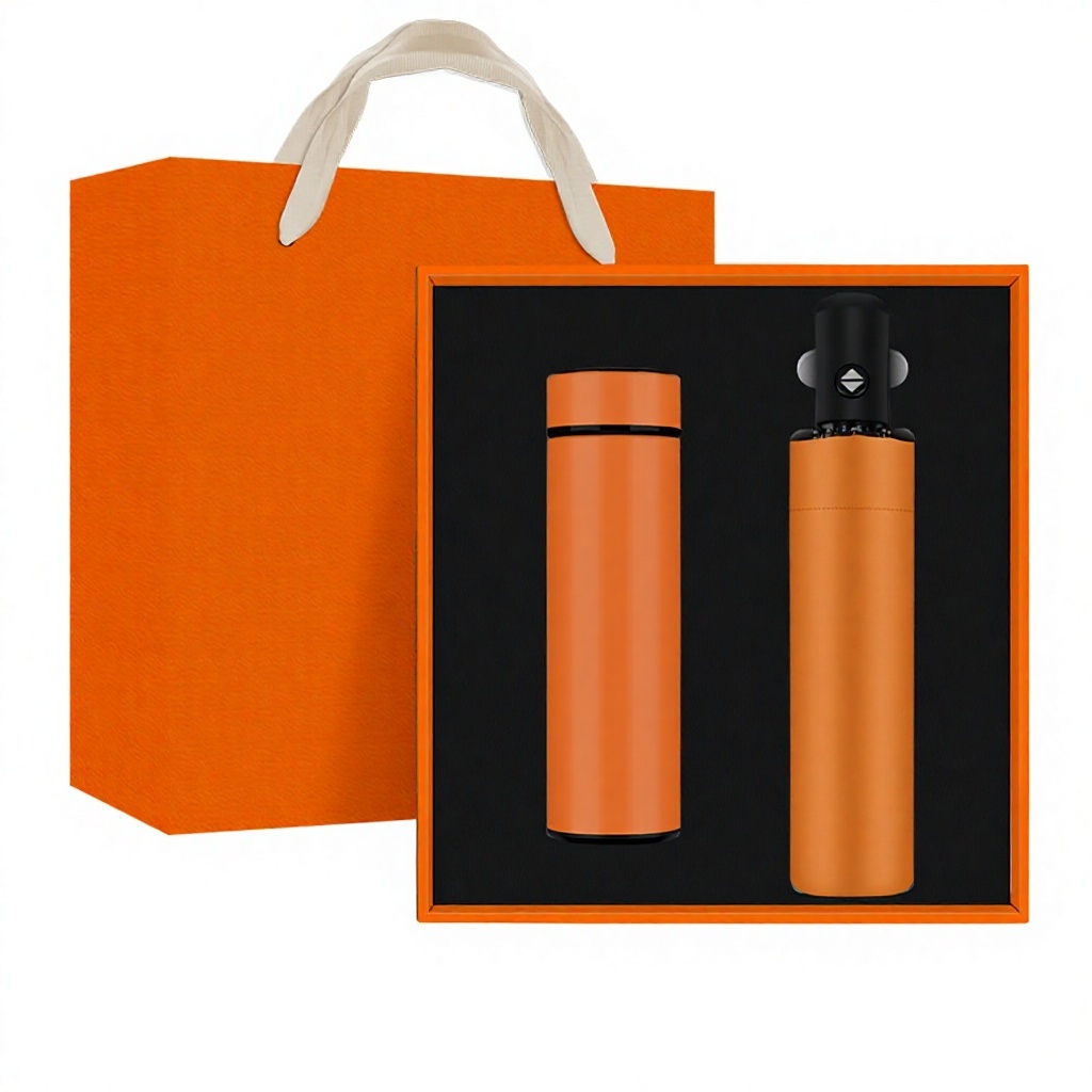 Caja de regalo desplegable con taza aislante y paraguas naranja