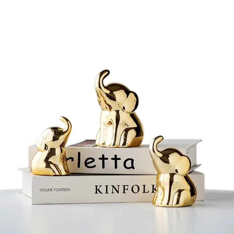Ornements créatifs en céramique de bureau de luxe nordique Statue d'éléphant doré Artisanat Design d'intérieur moderne Accessoires de décoration intérieure