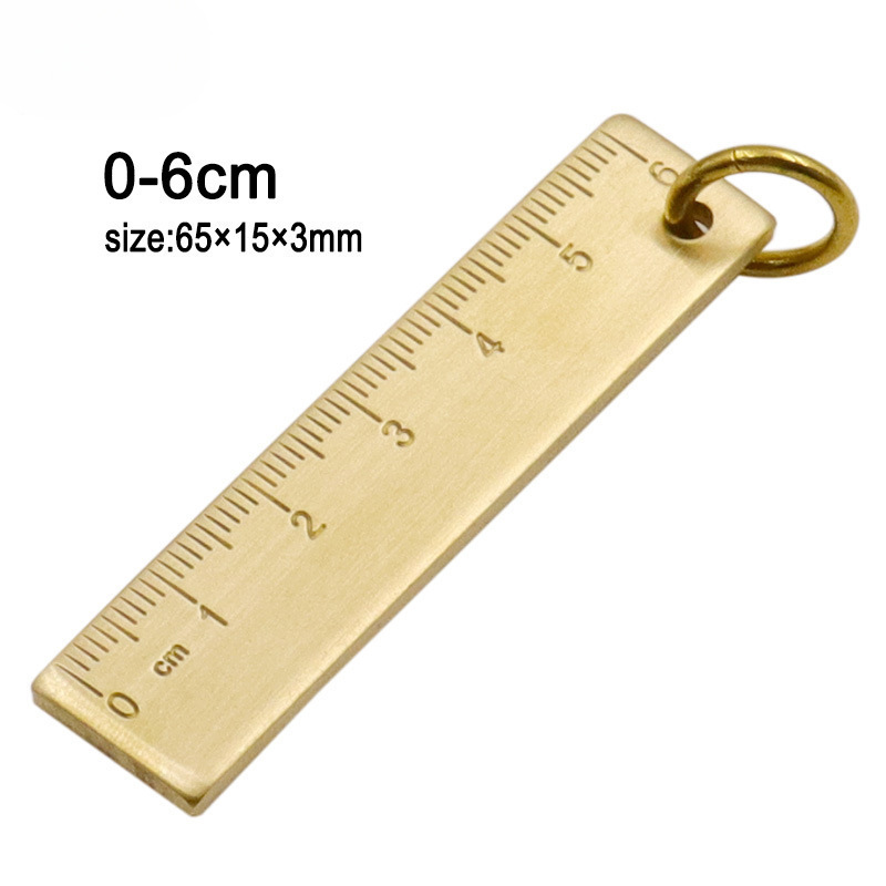 Regla de cobre llavero de 6 cm.