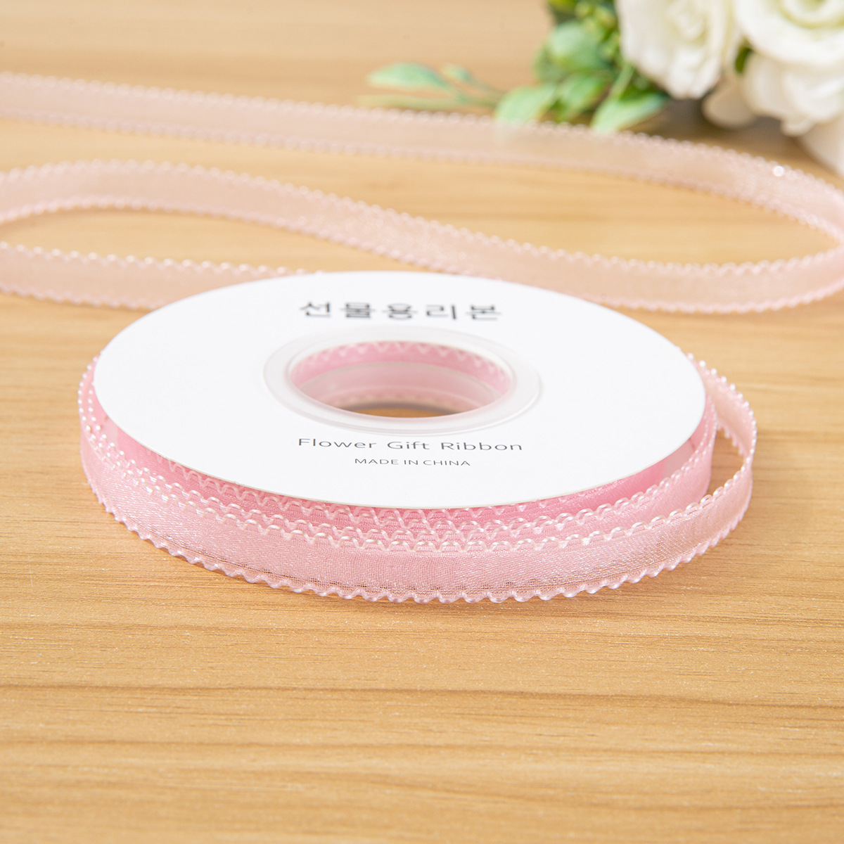 1 cm rose 10 mètres