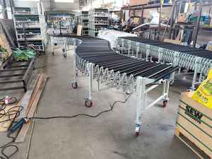 Cinta transportadora de descarga de carga de bolsas de 100kg motorizada flexible estándar Extensible, sistema de transporte expandible motorizado