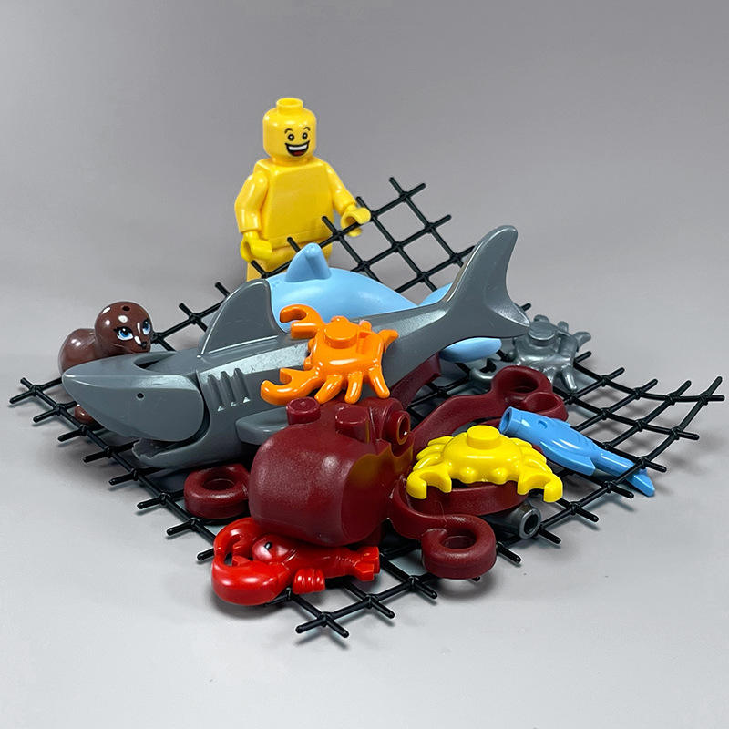 Una red de pesca, un pequeño hombre amarillo 8047.