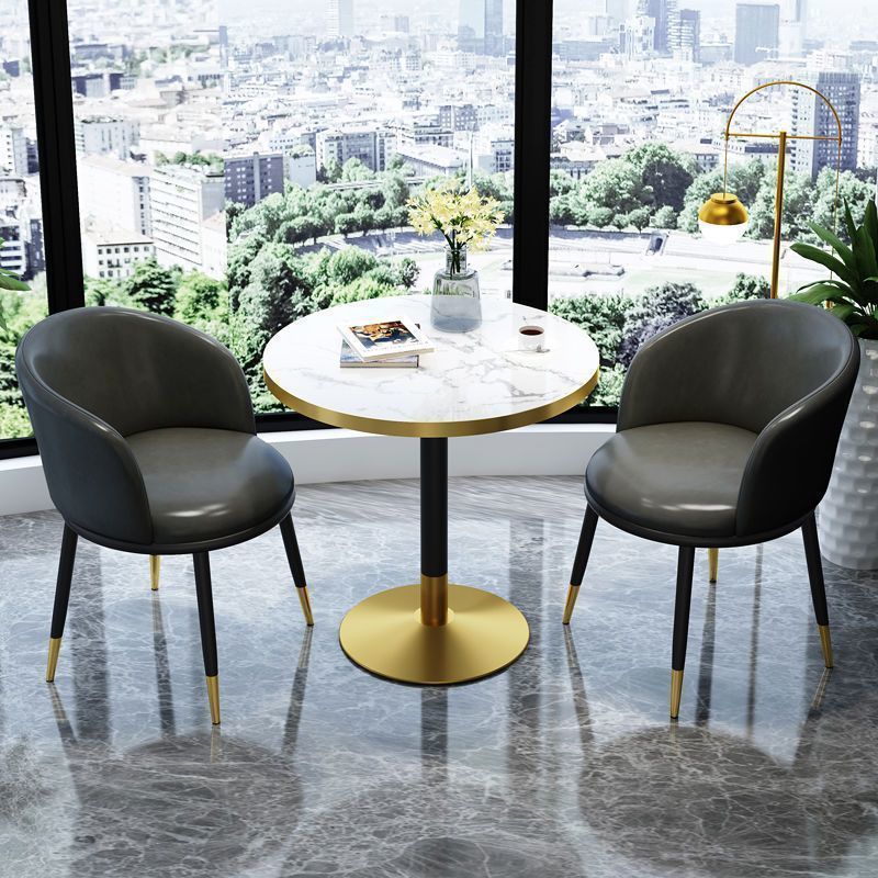 Dark grey leather chair imitation stone round table