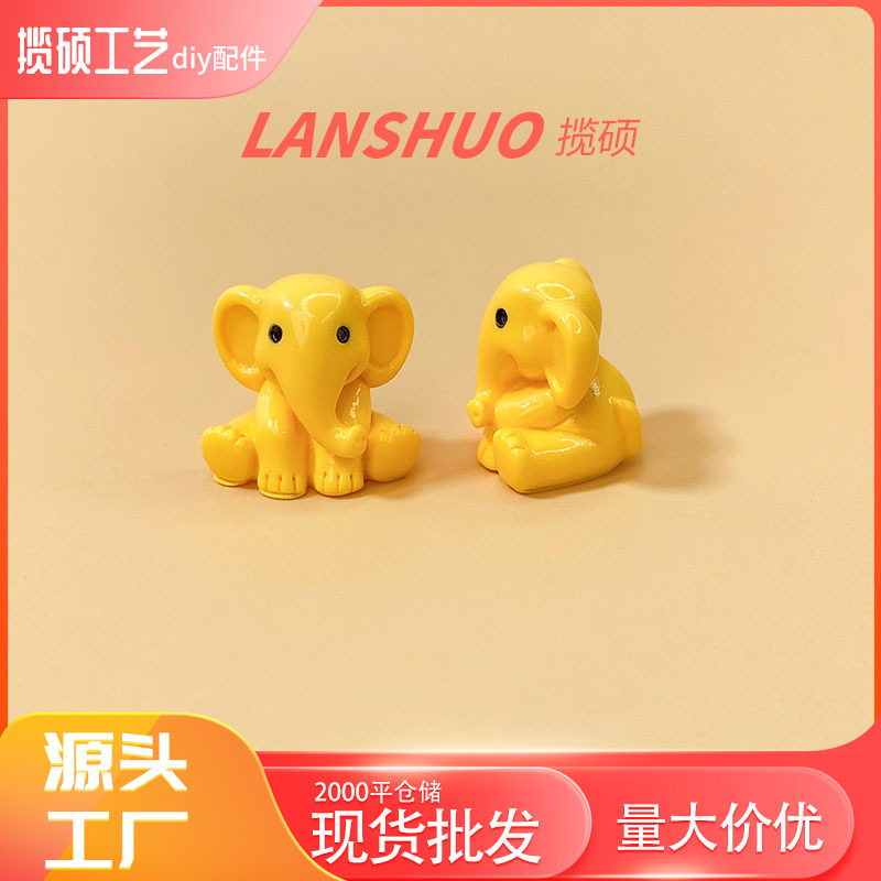 Yellow elephant figurine B-560-04