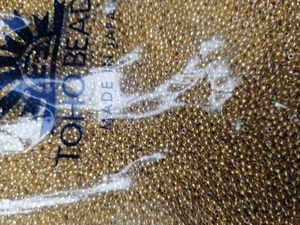 高品質2mm3mm 4mmPF557カラー保存金メッキ<span class=keywords><strong>TOHO</strong></span>ビーズグラム/バッグシードビーズジュエリー製作用