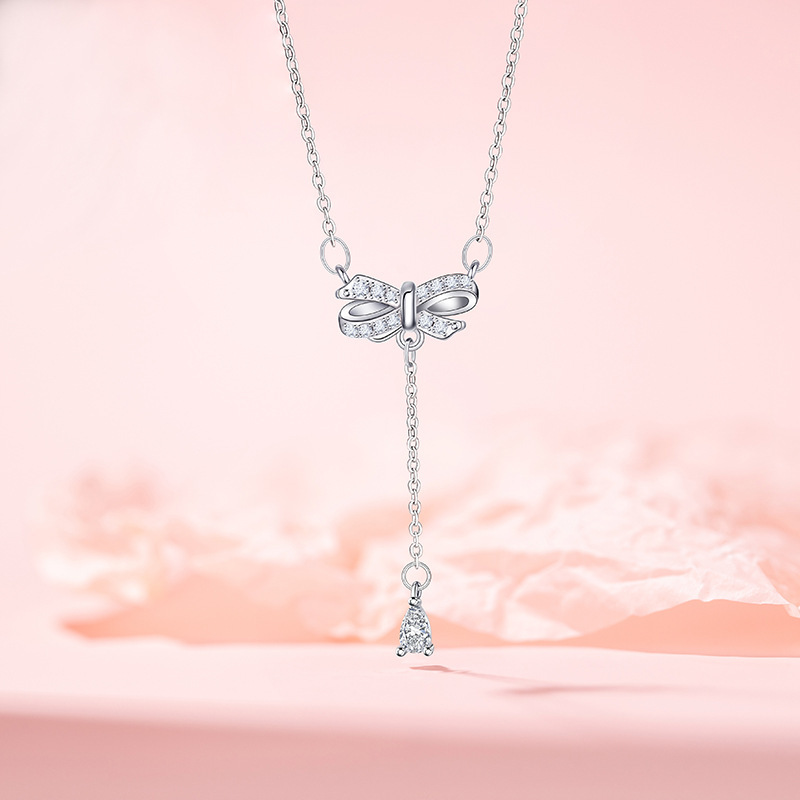 Collana con fiocco (acciaio inossidabile placcato platino)