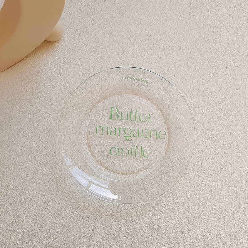 Assiette en verre à lettre verte unique