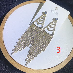 Lüks parlak toptan trend küpe hipoalerjenik S925 gümüş saplama küpe altın kaplama uzun püskül küpe kadınlar için