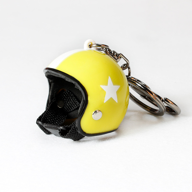 Chapeau jaune étoile blanche