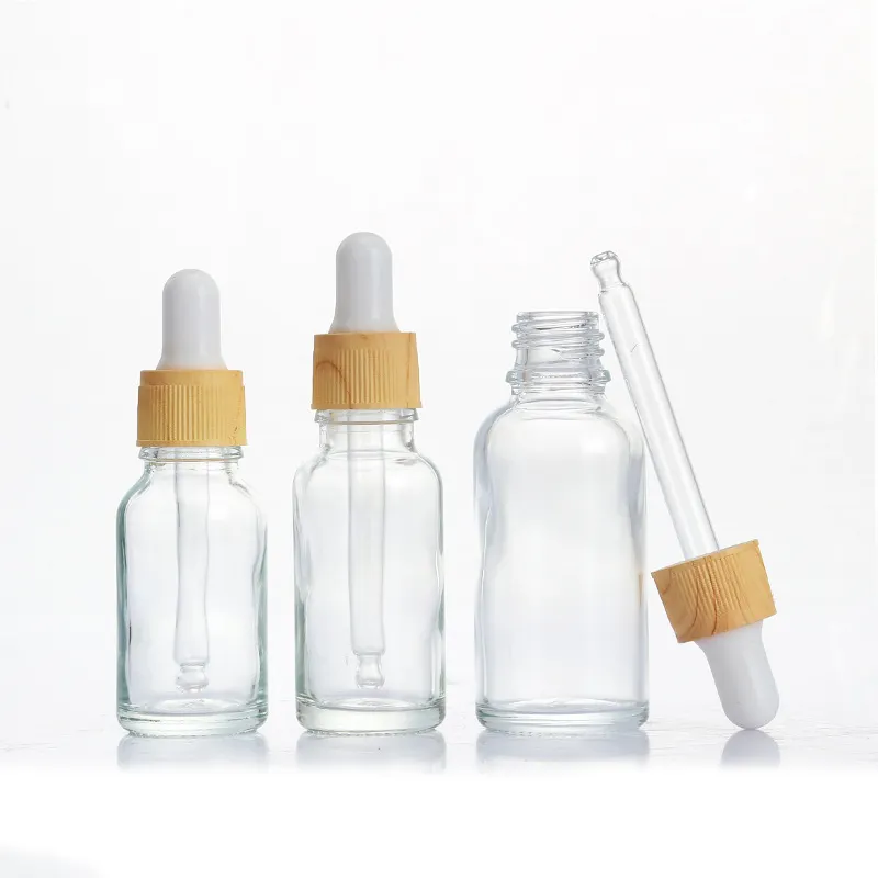 Botella de vidrio esmerilado transparente para base líquida, suero, aceite esencial, embalaje con tapas doradas y plateadas, 30ml