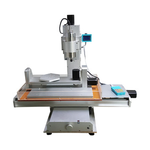 Tipo de Pilar Enrutador CNC de 5 ejes 3040 Máquina de talla de madera Fácil de operar Sistema de control Mach3 Columna Tipo de mesa - Product Image 1