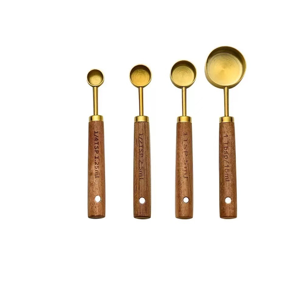 Ensemble de 4 cuillères à mesurer dorées