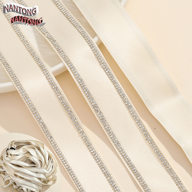 4. Four-row rhinestone - off-white webbing, 26mm wide