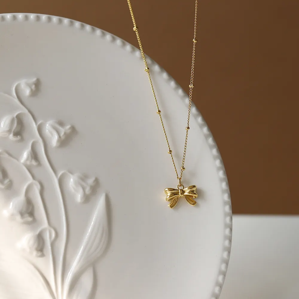 Principessa bowknot farfalla ciondolo collana placcata oro 18 carati bella catena clavicola ornamenti alla moda fabbrica di titanio s acciaio