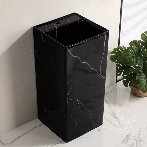 6107 Lavabo de columna única con diseño de piedra negra brillante.