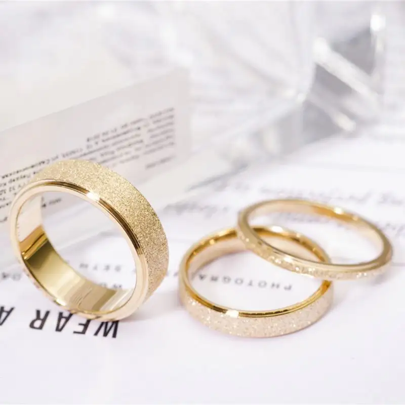 Gran oferta chapado en oro de moda elegante boda de acero inoxidable bandas anillos redondo para las mujeres