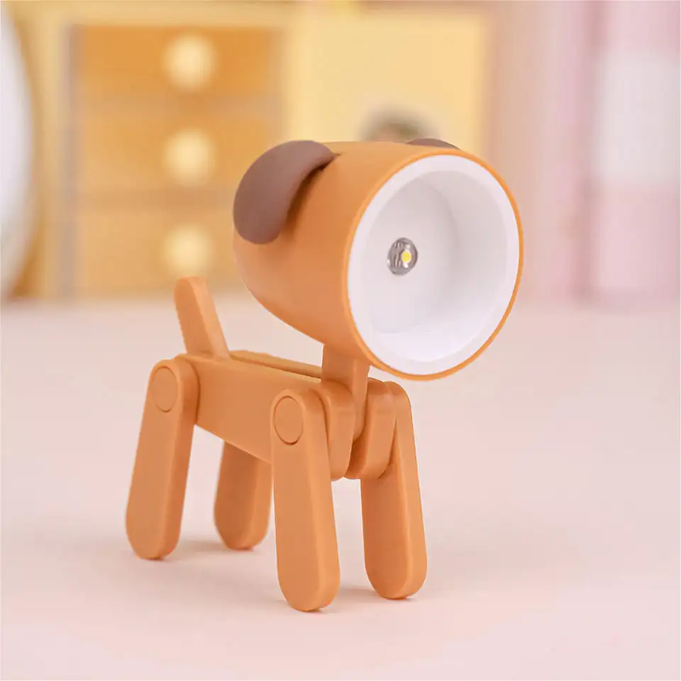 Pieghevole Mini Led lampada da scrivania creativa forma di cane piccole lampade da tavolo in plastica moderna Mining lampada Mini luce luce notturna del bambino