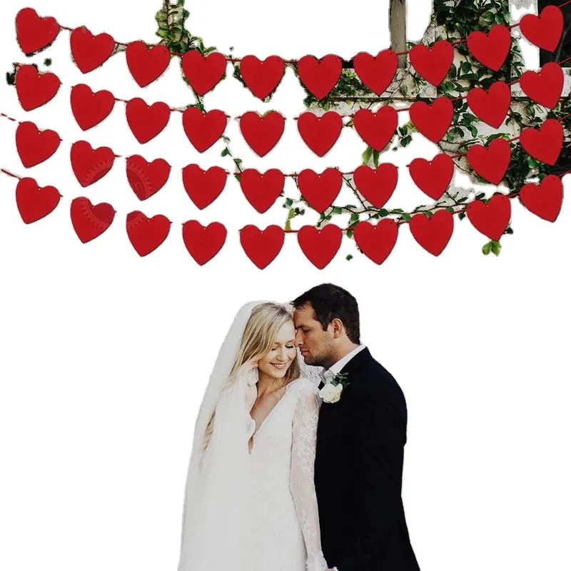 शादी की गर्म बिक्री की आपूर्ति वैलेंटाइन के दिन को प्यार पुल के झंडे गैर-बुने हुए दिल के आकार के बैनर तले किया