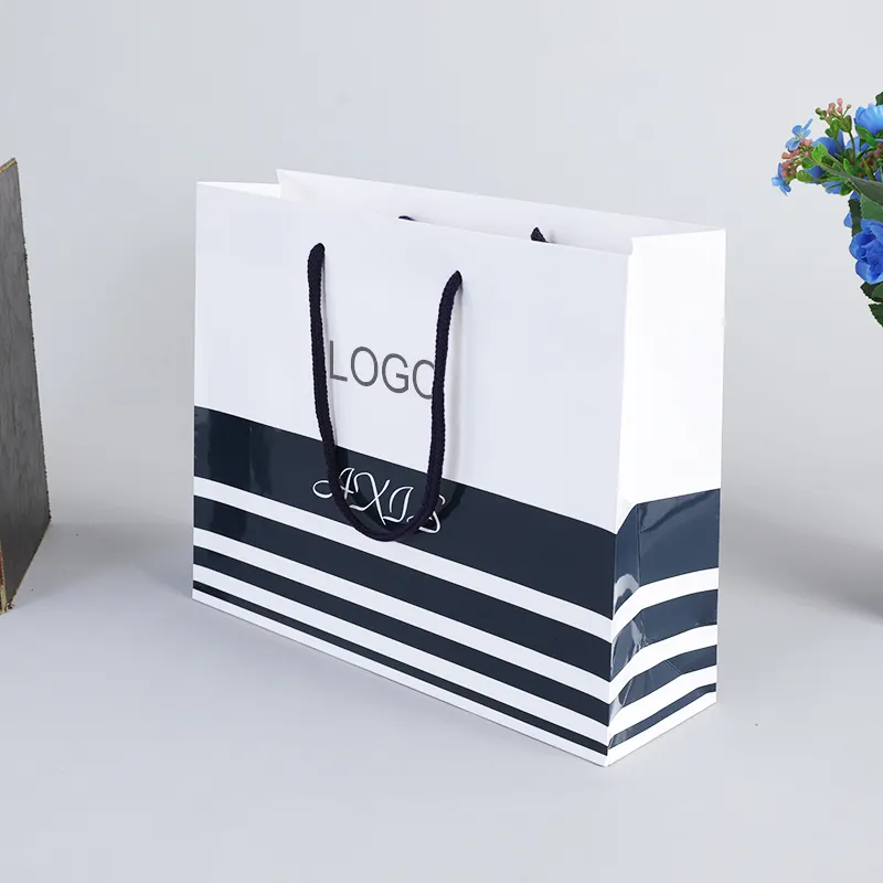 Custom stripe shopping bags luxe pour vetements luxo tirar embalagem saco de papel para pequenas empresas com seu próprio logotipo