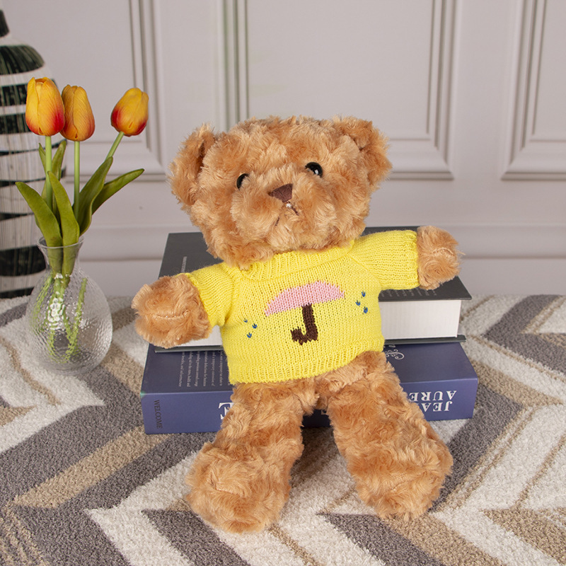 Yellow umbrella sweater brown bear