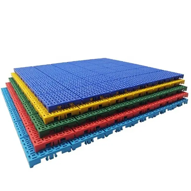 Plastic interlocking sports floor tile mats