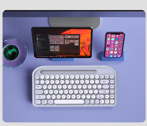 Nuevo diseño Cradle 4 Dispositivos Wireless Mini Mobile Slot Keyboard para iPad Tablet para Windows Android Mac