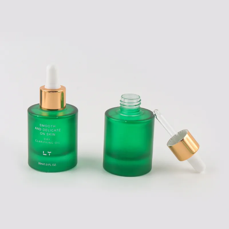Botellas de vidrio de aceite esencial de suero de vidrio de hombro de 30ml de lujo con pipeta cuentagotas de bomba