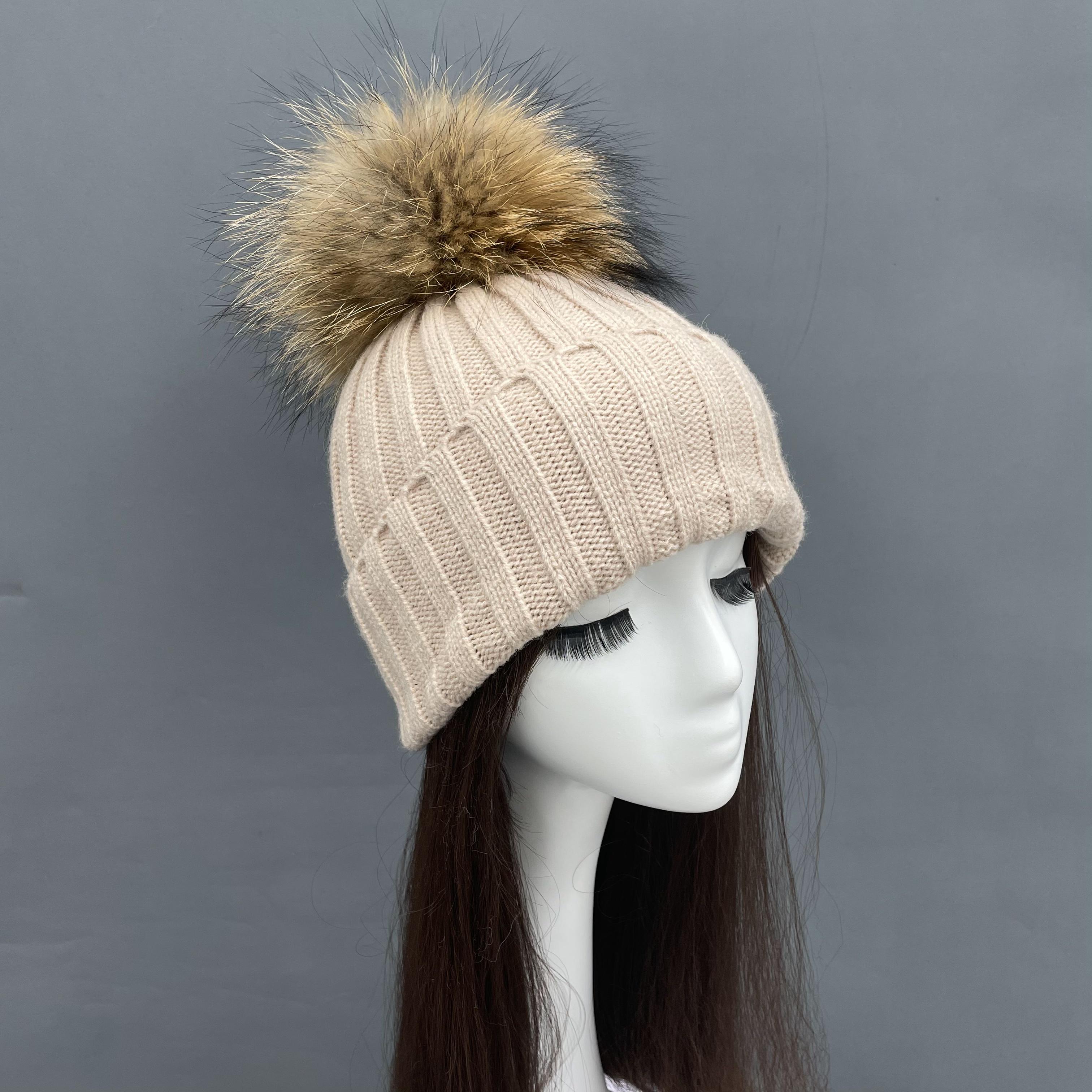Beige knitted beanie hat