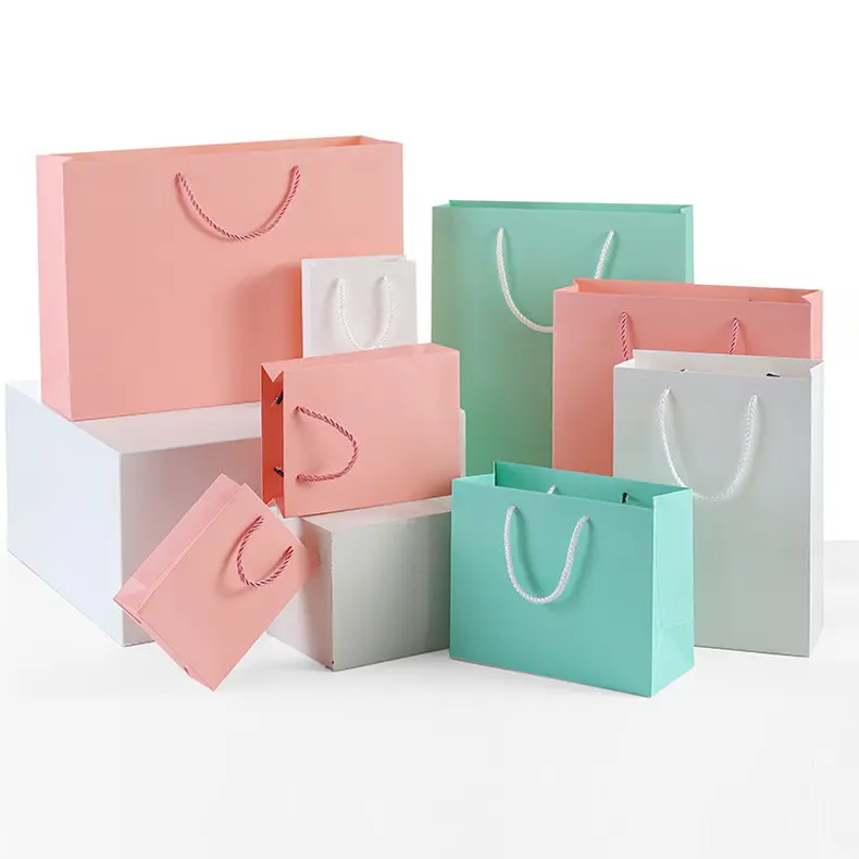 Bolsa de papel de regalo de colores brillantes de alta calidad, logotipo impreso personalizado, ropa, embalaje de joyería, bolsa de compras Kraft