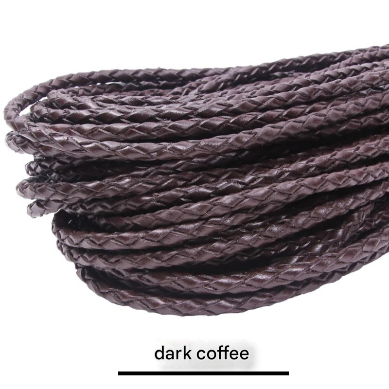 Cuero genuino trenzado de cuatro hebras, color marrón oscuro.