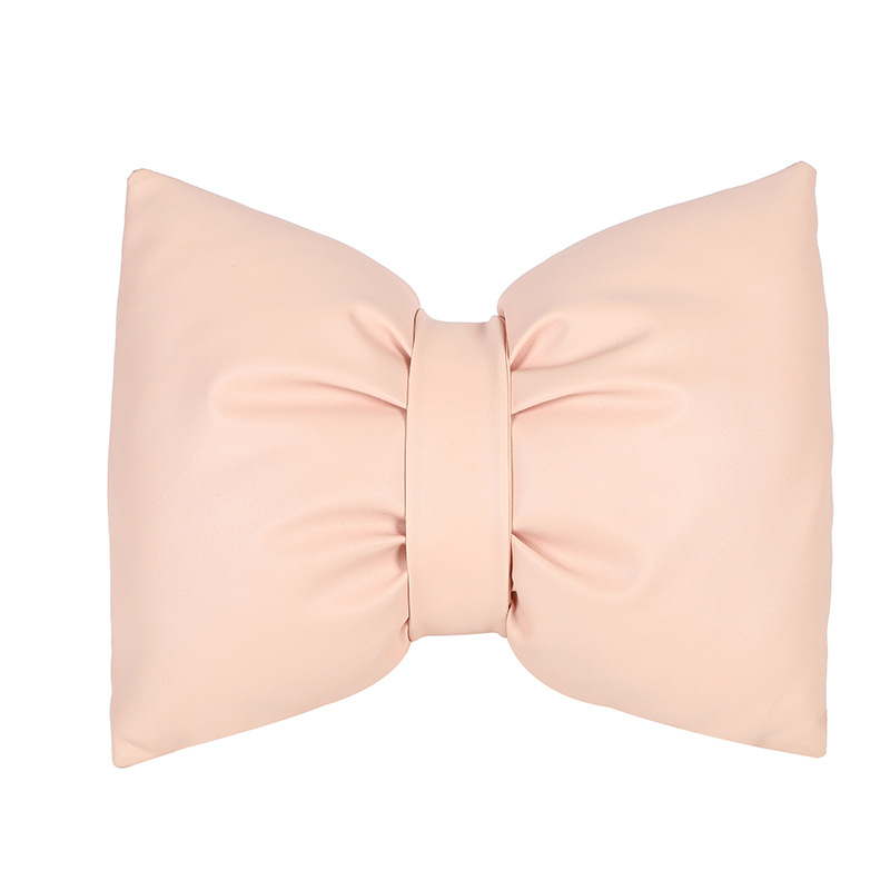 Support lombaire en cuir rose